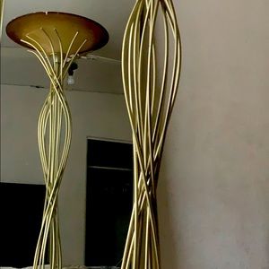 Goldish silver 6 foot tall living room lamp.